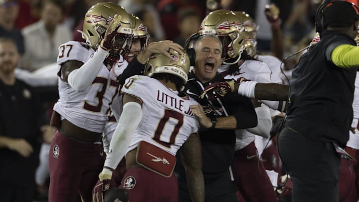 Oct 18, 2025; Stanford, California, USA; Florida State Seminoles head coach Mike Norvell celebrates with defensive back Earl Little Jr. (0) during the first quarter against the Stanford Cardinal at Stanford Stadium. Mandatory Credit: Stan Szeto-Imagn Images Oct 18, 2025; Stanford, California, USA; Florida State Seminoles head coach Mike Norvell celebrates with defensive back Earl Little Jr. (0) during the first quarter against the Stanford Cardinal at Stanford Stadium. Mandatory Credit: Stan Szeto-Imagn Images