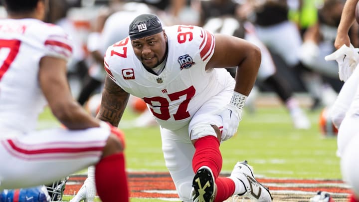 Sep 22, 2024; Cleveland, Ohio, USA; New York Giants defensive tackle Dexter Lawrence II (97) stretches during warm ups before the game against the Cleveland Browns at Huntington Bank Field. Sep 22, 2024; Cleveland, Ohio, USA; New York Giants defensive tackle Dexter Lawrence II (97) stretches during warm ups before the game against the Cleveland Browns at Huntington Bank Field.