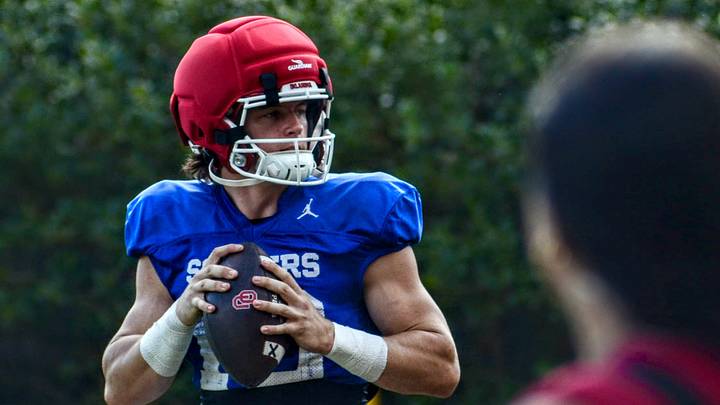 Oklahoma quarterback John Mateer drops back to pass during one of the Sooners' spring practices. Oklahoma quarterback John Mateer drops back to pass during one of the Sooners' spring practices.