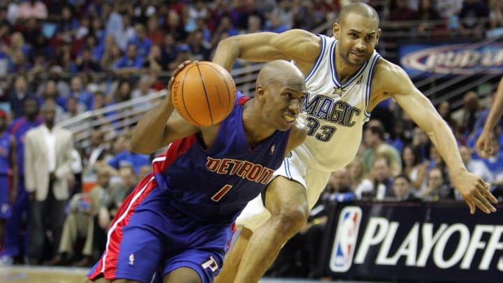 Pistons guard Chauncey Billups drives past against Magic forward Grant Hill during the second half Pistons guard Chauncey Billups drives past against Magic forward Grant Hill during the second half
