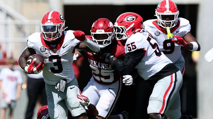Sep 19, 2026; Fayetteville, Arkansas, USA; Georgia Bulldogs running back Nate Frazier (3) runs with the ball against the Georgia Bulldogs Arkansas Razorbacks defensive back Shelton Lewis (2) during the second half at Donald W. Reynolds Razorback Stadium. Mandatory Credit: Nelson Chenault-Imagn Images Sep 19, 2026; Fayetteville, Arkansas, USA; Georgia Bulldogs running back Nate Frazier (3) runs with the ball against the Georgia Bulldogs Arkansas Razorbacks defensive back Shelton Lewis (2) during the second half at Donald W. Reynolds Razorback Stadium. Mandatory Credit: Nelson Chenault-Imagn Images