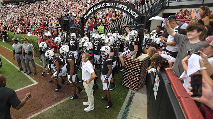Sep 14, 2024; Columbia, South Carolina, USA; South Carolina head coach Shane Beamer and team get ready to run on the field during the Tommy Suggs 2001 Entrance before a game against the LSU Tigers at Williams-Brice Stadium. Mandatory Credit: Ken Ruinard/USA TODAY Network via Imagn Images