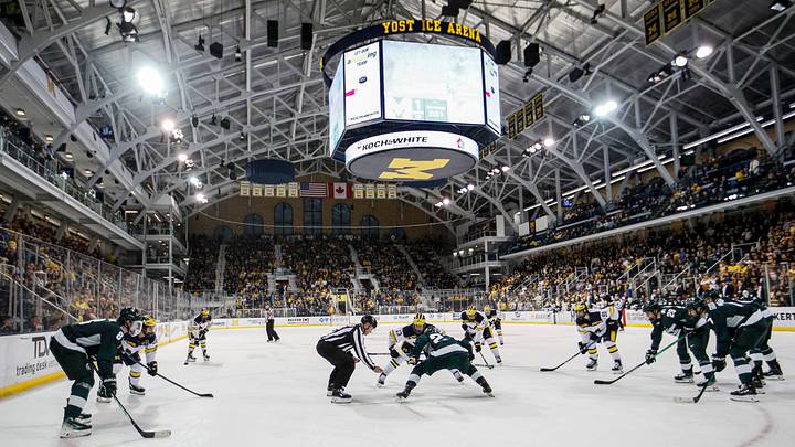 Michigan State center Red Savage and Michigan center TJ Hughes face off during the third period at Yost Ice Arena in Ann Arbor on Friday, Feb. 9, 2024.