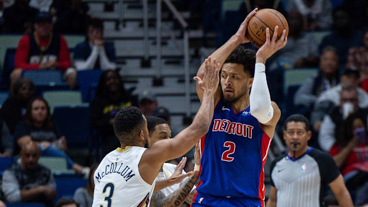 Nov 2, 2023; New Orleans, Louisiana, USA; Detroit Pistons guard Cade Cunningham (2) looks to pass against New Orleans Pelicans guard CJ McCollum (3) and guard Jordan Hawkins (24) during the first half at the Smoothie King Center. Mandatory Credit: Stephen Lew-Imagn Images Nov 2, 2023; New Orleans, Louisiana, USA; Detroit Pistons guard Cade Cunningham (2) looks to pass against New Orleans Pelicans guard CJ McCollum (3) and guard Jordan Hawkins (24) during the first half at the Smoothie King Center. Mandatory Credit: Stephen Lew-Imagn Images