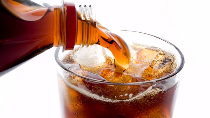 Soda being poured into a glass Soda being poured into a glass