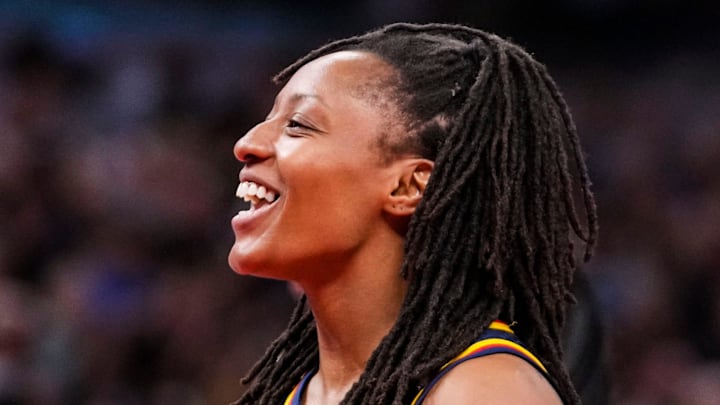 Indiana Fever guard Kelsey Mitchell (0) smiles Wednesday, July 10, 2024, during the game at Gainbridge Fieldhouse in Indianapolis.