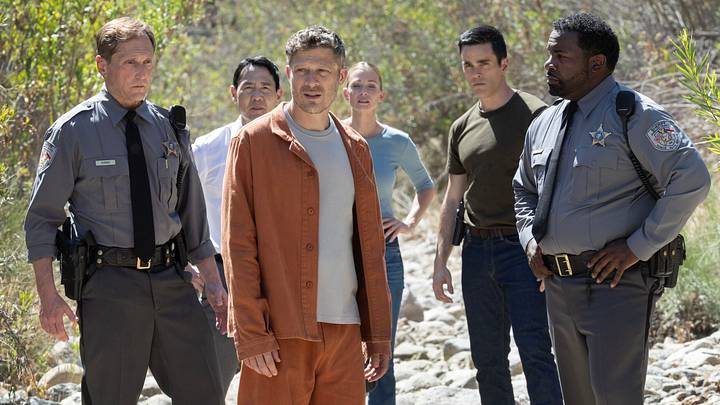 L-R: Rob Yang as District Attorney Emory Joy, Zach Gilford as Elias Voit, A.J. Cook as Jennifer ‘JJ’ Jareau and RJ Hatanaka as Tyler Green in Criminal Minds: Evolution, season 19 streaming on Paramount+, 2026. Photo Credit: Trae Patton/Paramount+