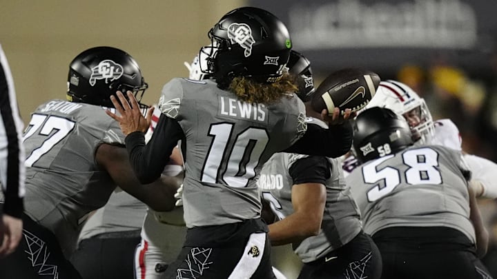 Nov 1, 2025; Boulder, Colorado, USA; Colorado Buffaloes quarterback Julian Lewis (10) prepares to pass the ball in the second half against the Arizona Wildcats at Folsom Field. Mandatory Credit: Ron Chenoy-Imagn Images