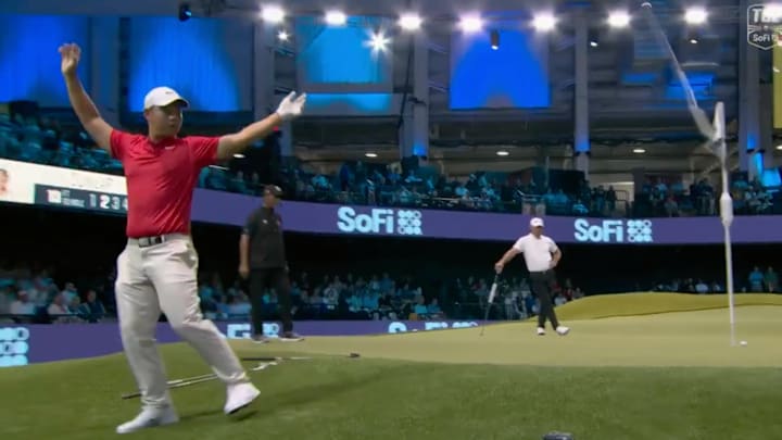 Tom Kim celebrates a very nice shot... that did not go in.