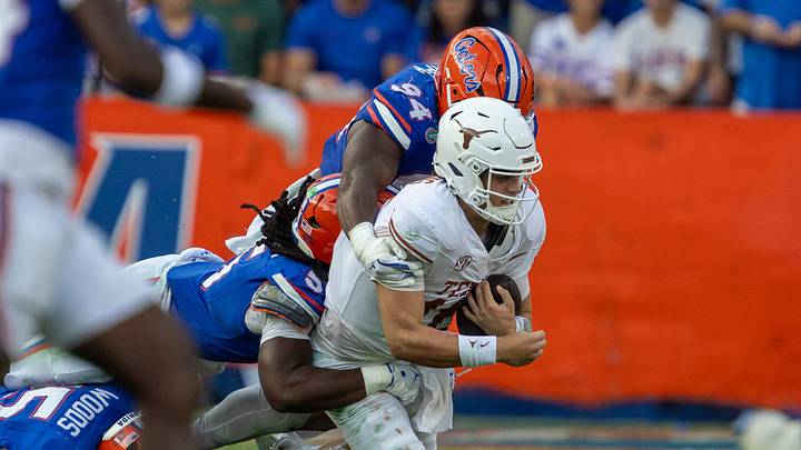 Florida Jamari Lyons takes down Texas quarterback Arch Manning (16) during the second half an NCAA football game in Gainesville, FL on Saturday, October 4, 2025. [Alan Youngblood/Gainesville Sun]