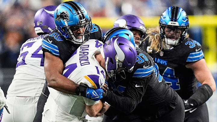 Detroit Lions linebacker Al-Quadin Muhammad (69) sacks Minnesota Vikings quarterback Sam Darnold (14).