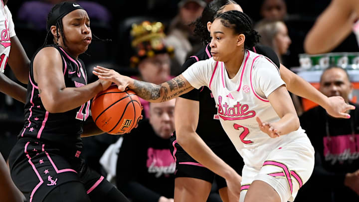 Mississippi State guard Jerkaila Jordan (2) slaps the away from Vanderbilt guard Jordyn Oliver (11) during an NCAA college basketball game Thursday, Feb. 13, 2025, in Nashville, Tenn.