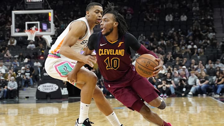 Jan 14, 2022; San Antonio, Texas, USA; Cleveland Cavaliers guard Darius Garland (10) drives to the basket while defended by San Antonio Spurs forward Keldon Johnson (3) during the second half at AT&T Center. Mandatory Credit: Scott Wachter-Imagn Images