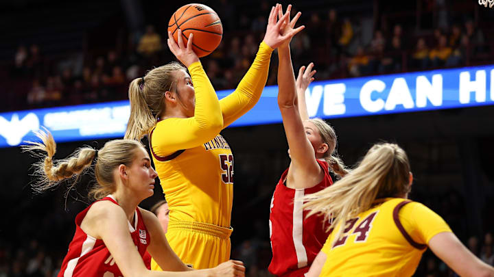 Jan 14, 2024; Minneapolis, Minnesota, USA; Minnesota Golden Gophers center Sophie Hart (52) shoots as against the Nebraska Cornhuskers during the first half at Williams Arena. Jan 14, 2024; Minneapolis, Minnesota, USA; Minnesota Golden Gophers center Sophie Hart (52) shoots as against the Nebraska Cornhuskers during the first half at Williams Arena.
