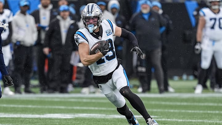 Dec 15, 2024; Charlotte, North Carolina, USA; Carolina Panthers wide receiver Adam Thielen (19) runs after a catch during the second half against the Dallas Cowboys at Bank of America Stadium. Mandatory Credit: Jim Dedmon-Imagn Images