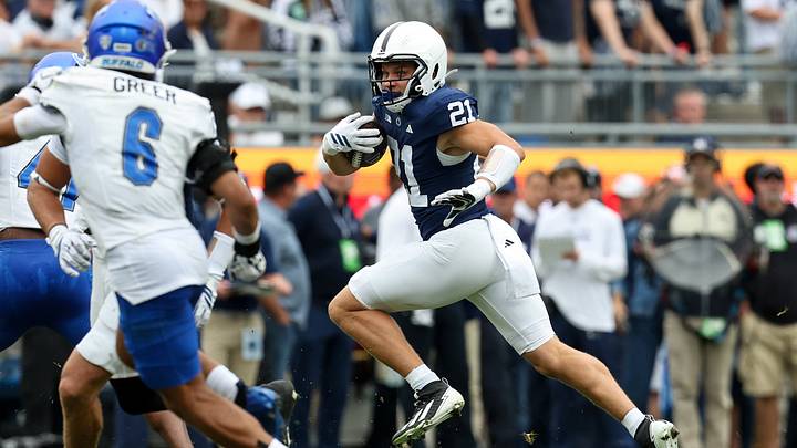Penn State Nittany Lions running back Carson Hansen (21) runs with the ball against the Buffalo Bulls at Beaver Stadium. 