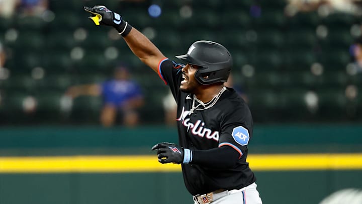 Miami Marlins catcher Brian Navarreto (70) reacts after hitting an rbi double during the twelfth inning against the Texas Rangers at Globe Life Field. 