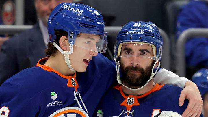 Oct 21, 2025; Elmont, New York, USA; New York Islanders defenseman Matthew Schaefer (48) talks to center Kyle Palmieri (21) during the second period against the San Jose Sharks at UBS Arena. Mandatory Credit: Brad Penner-Imagn Images