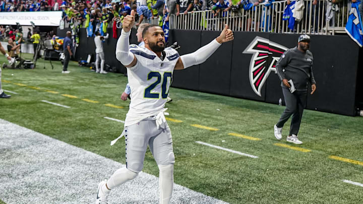 Oct 20, 2024; Atlanta, Georgia, USA; Seattle Seahawks safety Julian Love (20) reacts after the Seahawks defeated the Atlanta Falcons at Mercedes-Benz Stadium. Mandatory Credit: Dale Zanine-Imagn Images