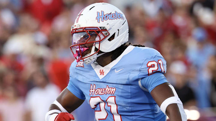 Oct 4, 2025; Houston, Texas, USA; Houston Cougars defensive back Zelmar Vedder (21) reacts to his defensive play against the Texas Tech Raiders in the first half at TDECU Stadium. Mandatory Credit: Thomas Shea-Imagn Images Oct 4, 2025; Houston, Texas, USA; Houston Cougars defensive back Zelmar Vedder (21) reacts to his defensive play against the Texas Tech Raiders in the first half at TDECU Stadium. Mandatory Credit: Thomas Shea-Imagn Images