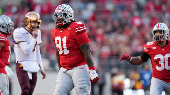 Nov 18, 2023; Columbus, Ohio, USA; Ohio State Buckeyes defensive tackle Tyleik Williams (91) celebrates a tackle during the NCAA football game against the Minnesota Golden Gophers at Ohio Stadium.