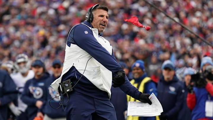 Nov 28, 2021; Foxborough, Massachusetts, USA; Tennessee Titans head coach Mike Vrabel throws a red challenge flag from the sideline as they take on the New England Patriots in the first half at Gillette Stadium. Nov 28, 2021; Foxborough, Massachusetts, USA; Tennessee Titans head coach Mike Vrabel throws a red challenge flag from the sideline as they take on the New England Patriots in the first half at Gillette Stadium.