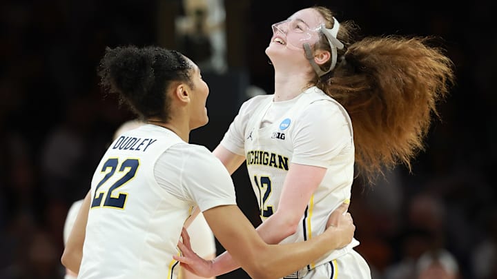 Michigan’s sophomores, including Syla Swords (right) and Kendall Dudley (left), did it again against Louisville as the Wolverines advance to the Elite Eight for just the second time. 