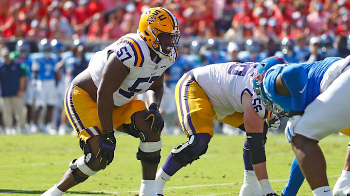 Sep 27, 2025; Oxford, Mississippi, USA; LSU Tigers offensive lineman Carius Curne (57) waits for the snap during the first quarter against the Mississippi Rebels at Vaught-Hemingway Stadium. Mandatory Credit: Petre Thomas-Imagn Images Sep 27, 2025; Oxford, Mississippi, USA; LSU Tigers offensive lineman Carius Curne (57) waits for the snap during the first quarter against the Mississippi Rebels at Vaught-Hemingway Stadium. Mandatory Credit: Petre Thomas-Imagn Images