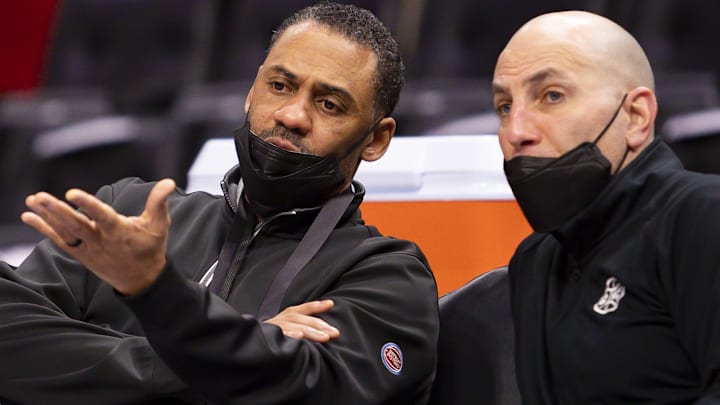 Feb 10, 2022; Detroit, Michigan, USA; Detroit Pistons general manager Troy Weaver (left): Raj Mehta-Imagn Images