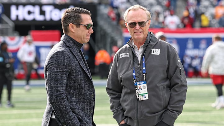 Nov 24, 2024; East Rutherford, New Jersey, USA; New York Giants owner John Mara, left, and New York Giants general manager Joe Schoen on the field before the game between the Giants and the Tampa Bay Buccaneers at MetLife Stadium. Mandatory Credit: Vincent Carchietta-Imagn Images
