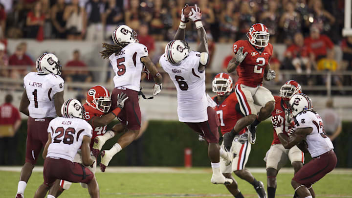 South Carolina football defensive lineman Melvin Ingram fielding an onside kick to secure a win over the rival Georgia Bulldogs in 2011