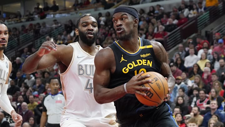 Feb 8, 2025; Chicago, Illinois, USA; Chicago Bulls forward Patrick Williams (44) defends Golden State Warriors forward Jimmy Butler (10) during the first half at United Center. Mandatory Credit: David Banks-Imagn Images