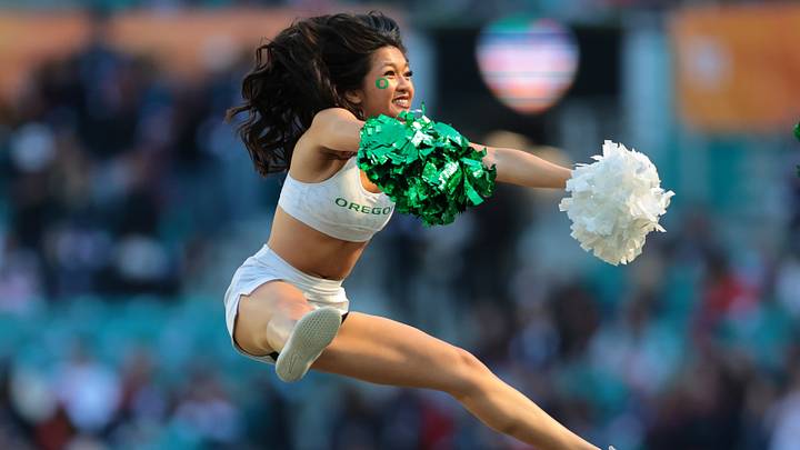 Jan 1, 2026; Miami Gardens, FL, USA; The Oregon Duck cheerleaders fire up the crowd perform prior to the 2025 Orange Bowl and quarterfinal game of the College Football Playoff against the Texas Tech Red Raiders at Hard Rock Stadium. Mandatory Credit: Sam Navarro-Imagn Images
