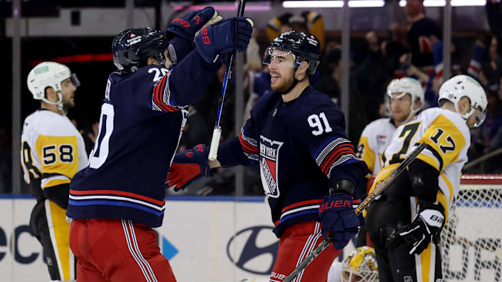 Dec 6, 2024; New York, New York, USA; New York Rangers right wing Reilly Smith (91) celebrates his goal against the Pittsburgh Penguins with left wing Chris Kreider (20) during the third period at Madison Square Garden. Mandatory Credit: Brad Penner-Imagn Images