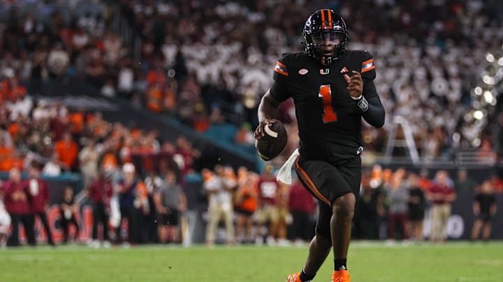 Oct 26, 2024; Miami Gardens, Florida, USA; Miami Hurricanes quarterback Cam Ward (1) runs with the football against the Florida State Seminoles during the second quarter at Hard Rock Stadium. Mandatory Credit: Sam Navarro-Imagn Images Oct 26, 2024; Miami Gardens, Florida, USA; Miami Hurricanes quarterback Cam Ward (1) runs with the football against the Florida State Seminoles during the second quarter at Hard Rock Stadium. Mandatory Credit: Sam Navarro-Imagn Images