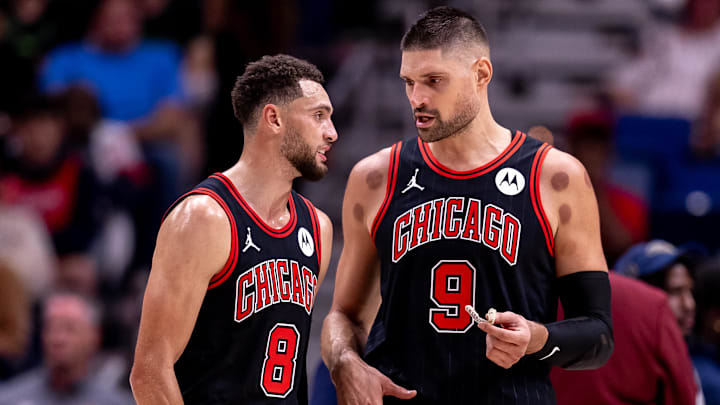 Oct 23, 2024; New Orleans, Louisiana, USA;  Chicago Bulls guard Zach LaVine (8) and center Nikola Vucevic (9) talk on a time out against the New Orleans Pelicans during the first half at Smoothie King Center. Mandatory Credit: Stephen Lew-Imagn Images