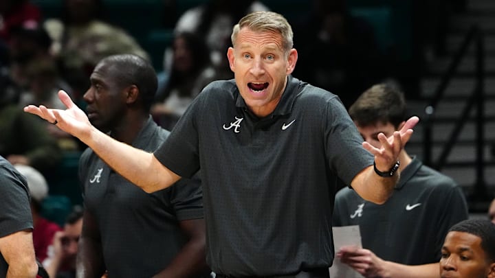 Nov 27, 2024; Las Vegas, Nevada, USA; Alabama Crimson Tide head coach Nate Oats protests a call in favor of the Rutgers Scarlet Knights during the first half at MGM Grand Garden Arena. Mandatory Credit: Stephen R. Sylvanie-Imagn Images