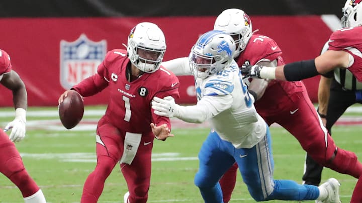 Arizona Cardinals quarterback Kyler Murray (1) is brought down by Detroit Lions defensive end Romeo Okwara (95) during the third quarter at State Farm Stadium Sept. 27, 2020.