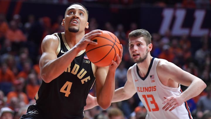 Purdue Boilermakers forward Trey Kaufman-Renn drives the ball past Illinois Fighting Illini center Tomislav Ivisic.