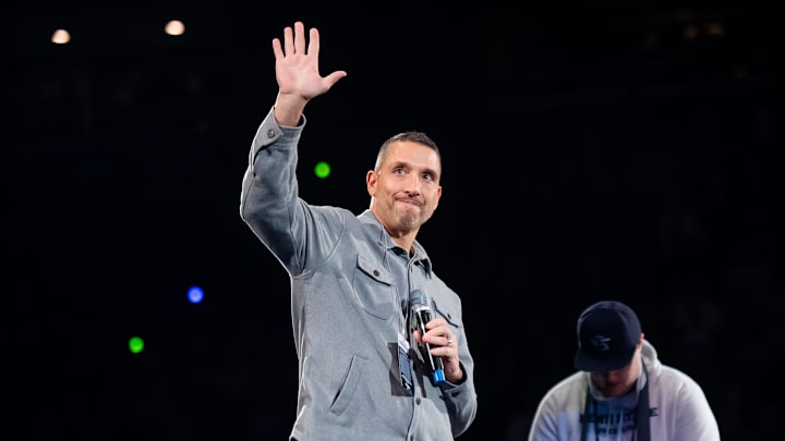 First-year Penn State football head coach Matt Campbell waves to the crowd during a Big Ten wrestling dual meet against Nebraska on January 30, 2026, in State College.