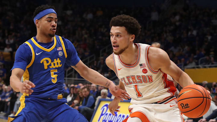 Jan 18, 2025; Pittsburgh, Pennsylvania, USA; Clemson Tigers guard Chase Hunter (1) drives to the basket against Pittsburgh Panthers guard Ishmael Leggett (5) during the first half at the Petersen Events Center. Jan 18, 2025; Pittsburgh, Pennsylvania, USA; Clemson Tigers guard Chase Hunter (1) drives to the basket against Pittsburgh Panthers guard Ishmael Leggett (5) during the first half at the Petersen Events Center.