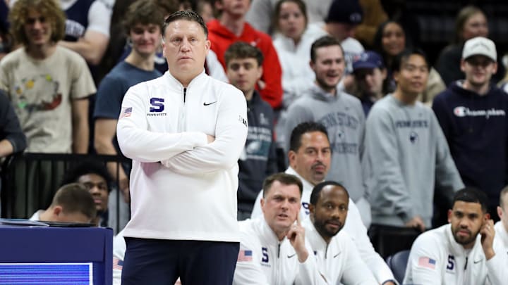 Penn State Nittany Lions basketball coach Mike Rhoades looks on from the bench during the first half against the Navy Midshipmen at Bryce Jordan Center. Penn State Nittany Lions basketball coach Mike Rhoades looks on from the bench during the first half against the Navy Midshipmen at Bryce Jordan Center.