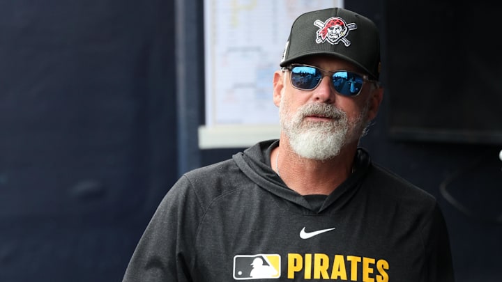 Mar 16, 2025; Tampa, Florida, USA;  Pittsburgh Pirates manager Derek Shelton (17) looks on in the dugout during the second inning against the New York Yankees at George M. Steinbrenner Field. Mandatory Credit: Kim Klement Neitzel-Imagn Images