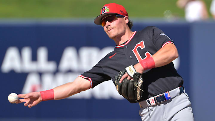 Feb 21, 2026; Phoenix, Arizona, USA;  Cleveland Guardians second baseman Travis Bazzana (72) makes a play  in the fourth inning against the Milwaukee Brewers at American Family Fields of Phoenix. Mandatory Credit: Jayne Kamin-Oncea-Imagn Images