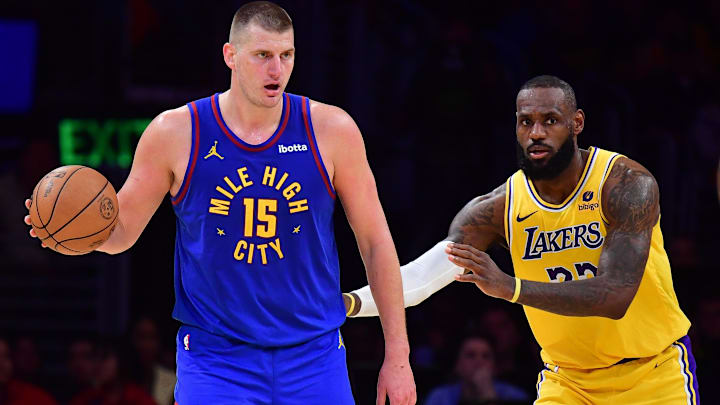 Denver Nuggets center Nikola Jokic (15) controls the ball against Los Angeles Lakers forward LeBron James (23)  during the second half in game three of the first round for the 2024 NBA playoffs at Crypto.com Arena.