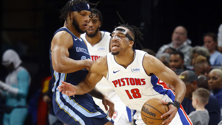 Apr 5, 2024; Memphis, Tennessee, USA; Detroit Pistons forward Tosan Evbuomwan (18) drives to the basket as Memphis Grizzlies forward Lamar Stevens (24) defends during the first half at FedExForum. Mandatory Credit: Petre Thomas-Imagn Images Apr 5, 2024; Memphis, Tennessee, USA; Detroit Pistons forward Tosan Evbuomwan (18) drives to the basket as Memphis Grizzlies forward Lamar Stevens (24) defends during the first half at FedExForum. Mandatory Credit: Petre Thomas-Imagn Images