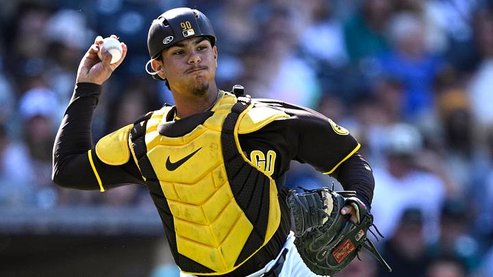 Mar 26, 2024; San Diego, California, USA; San Diego Padres catcher Ethan Salas throws to first base during the ninth inning against the Seattle Mariners at Petco Park. Mandatory Credit: Orlando Ramirez-USA TODAY Sports