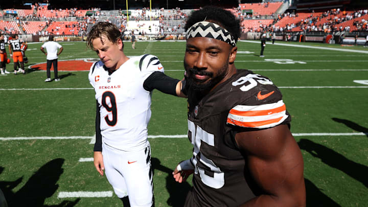 Sep 7, 2025; Cleveland, Ohio, USA; Cincinnati Bengals quarterback Joe Burrow (9) and Cleveland Browns defensive end Myles Garrett (95) greet each other after a game at Huntington Bank Field. Mandatory Credit: Scott Galvin-Imagn Images Sep 7, 2025; Cleveland, Ohio, USA; Cincinnati Bengals quarterback Joe Burrow (9) and Cleveland Browns defensive end Myles Garrett (95) greet each other after a game at Huntington Bank Field. Mandatory Credit: Scott Galvin-Imagn Images
