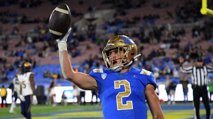 Nov 27, 2021; Pasadena, California, USA;    UCLA Bruins wide receiver Kyle Philips (2) celebrates after catching a touchdown pass against the California Golden Bears in the second half at the Rose Bowl. Mandatory Credit: Jayne Kamin-Oncea-Imagn Images