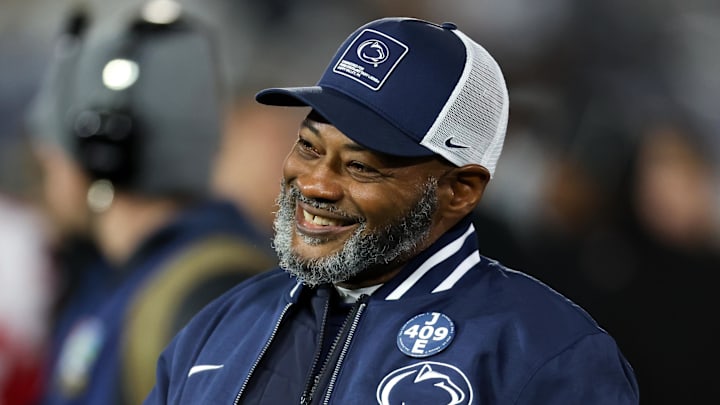 Penn State Nittany Lions interim head coach Terry Smith walks on the field prior to the game against the Nebraska Cornhuskers at Beaver Stadium. Penn State Nittany Lions interim head coach Terry Smith walks on the field prior to the game against the Nebraska Cornhuskers at Beaver Stadium.